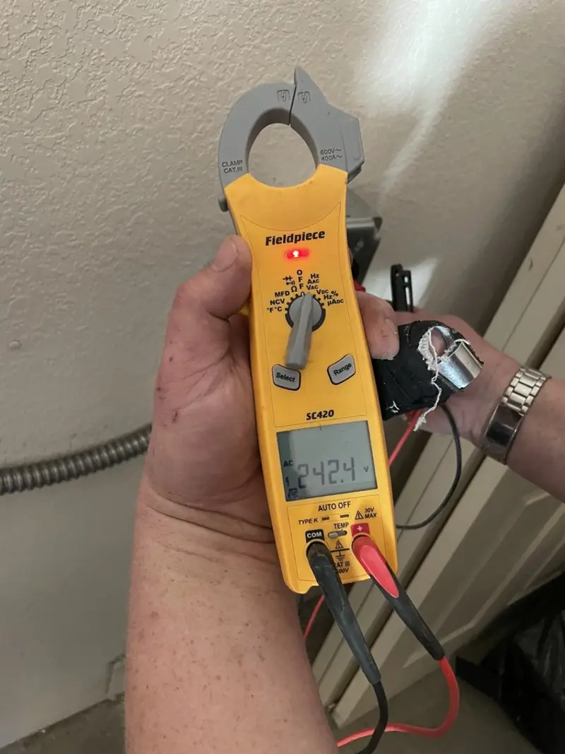 Voltage testing with clamp meter during Electrical Installation Services in Smithton